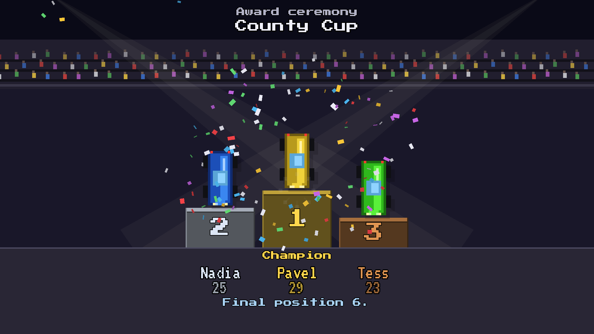 Three cars on a podium with fireworks above